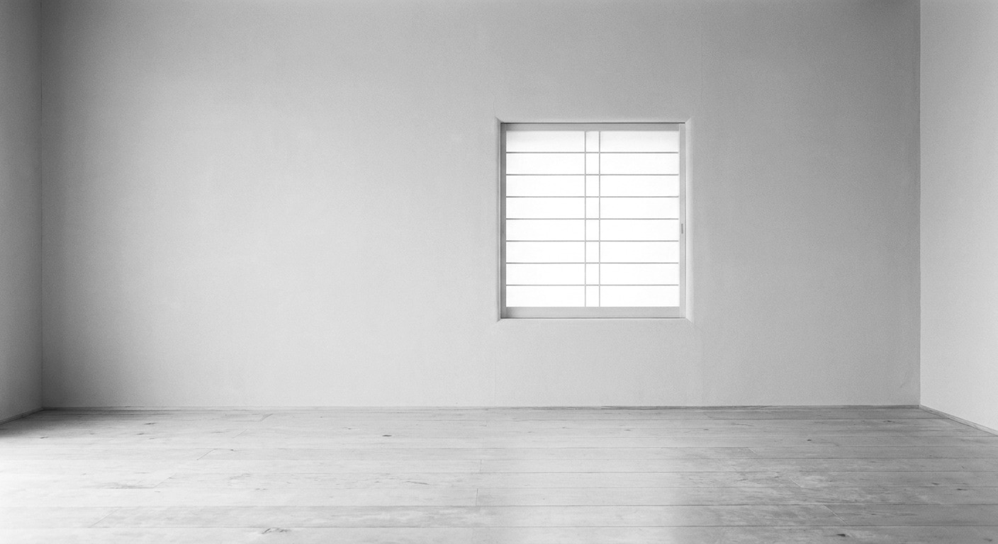 Board-formed concrete meeting a shoji screen at a clean vertical seam
